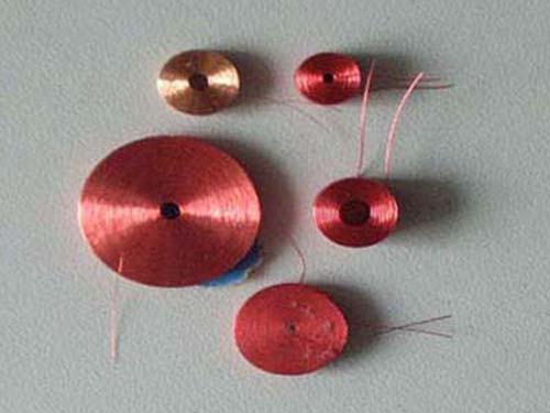 Self-adhesive coil